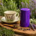 Purple tea tin in garden with a tea cup