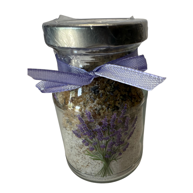 Glass jar with lavender design and a purple ribbon on a white background